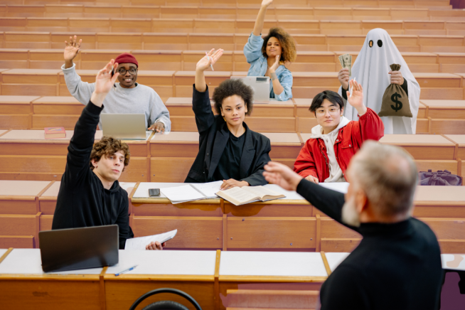 Students raising hands in a lecture hall with a ghost holding a money bag, symbolising financial aid fraud in colleges.